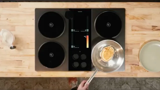 A pancake cooking in a pan on an Impulse cooktop